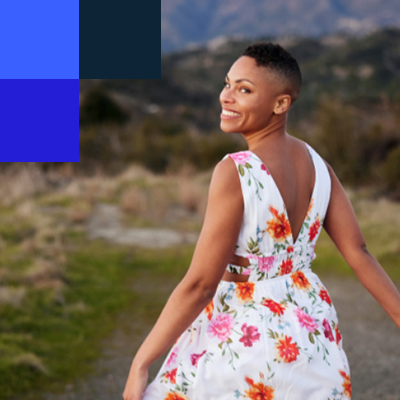 smiling woman in a floral dress