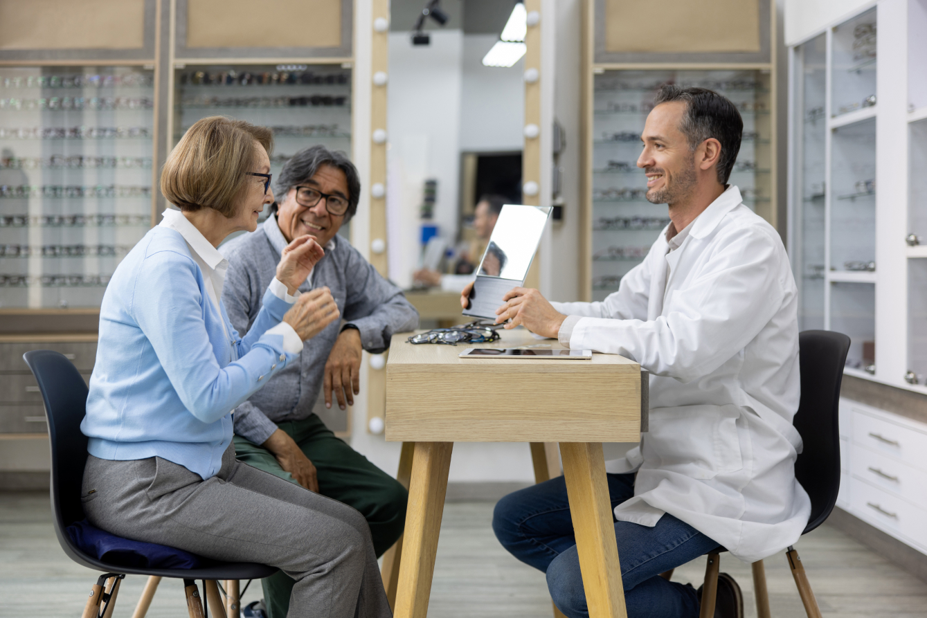 two people getting a prescription from optometrist