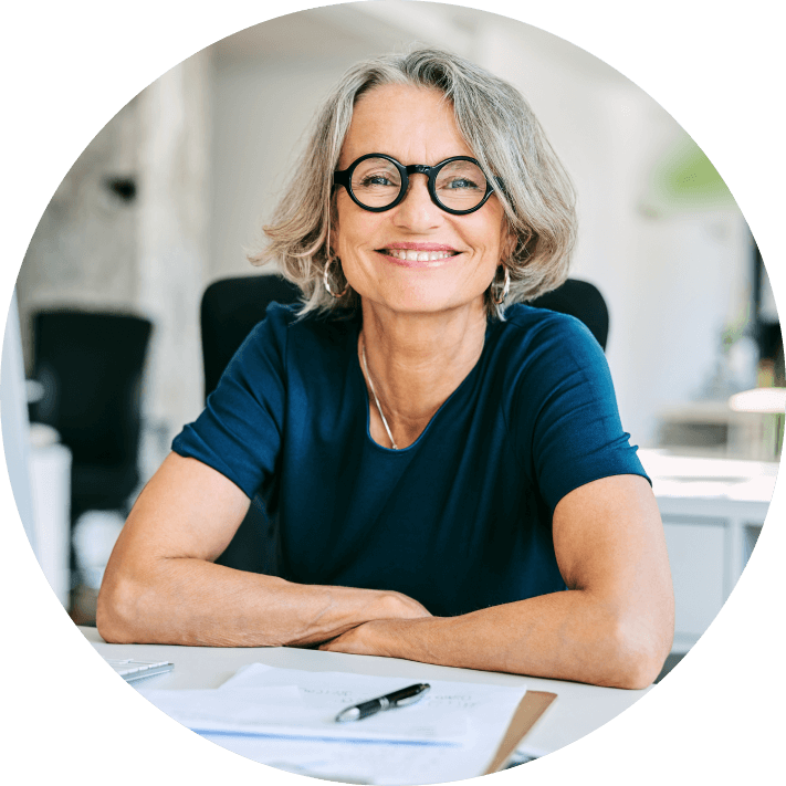 Woman smiling at desk