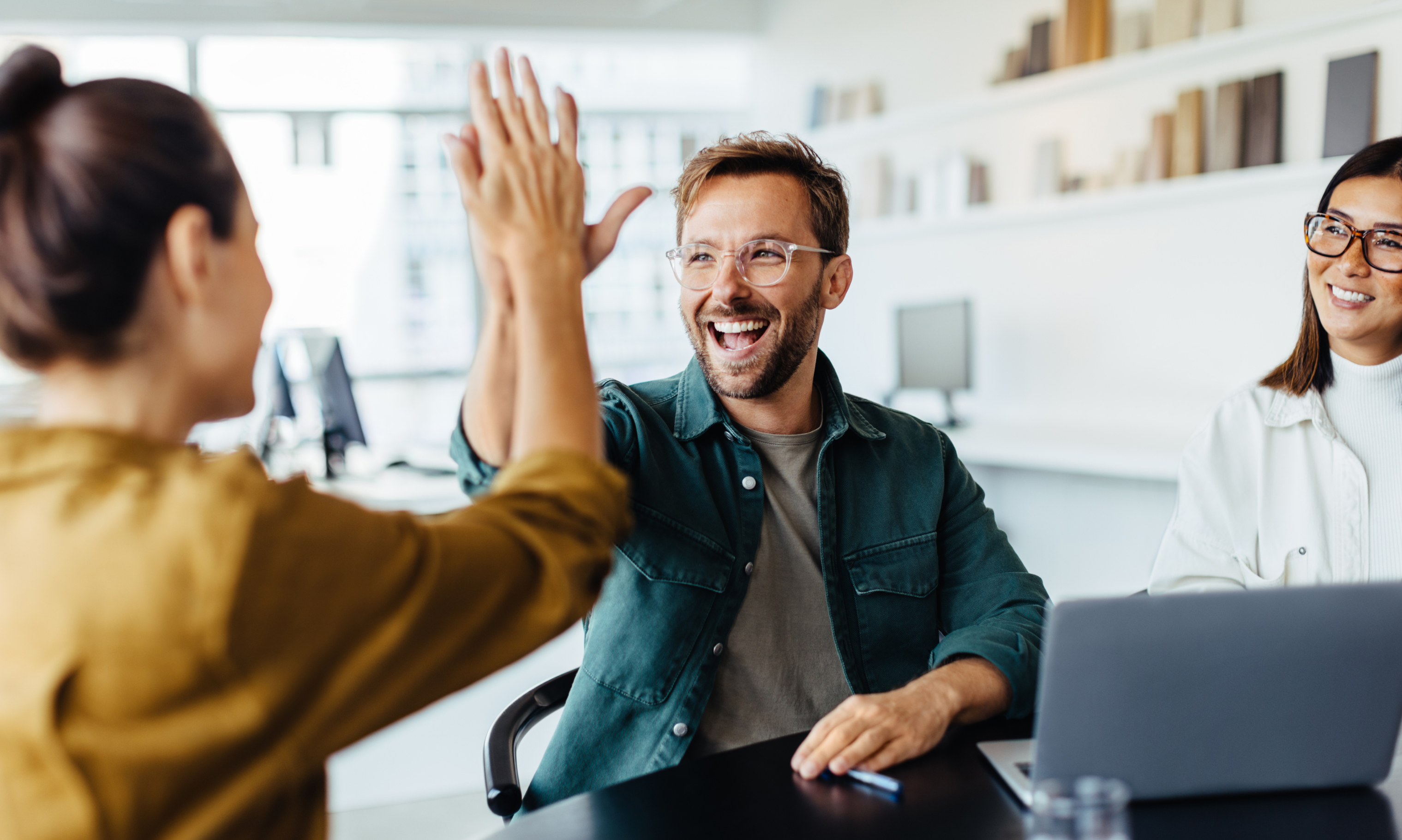 man high-fiving doctor