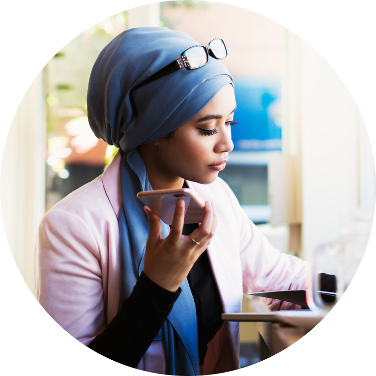 woman using phone while working